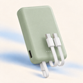 CozyWrap mini power bank in Matcha Green with three built-in charging cables